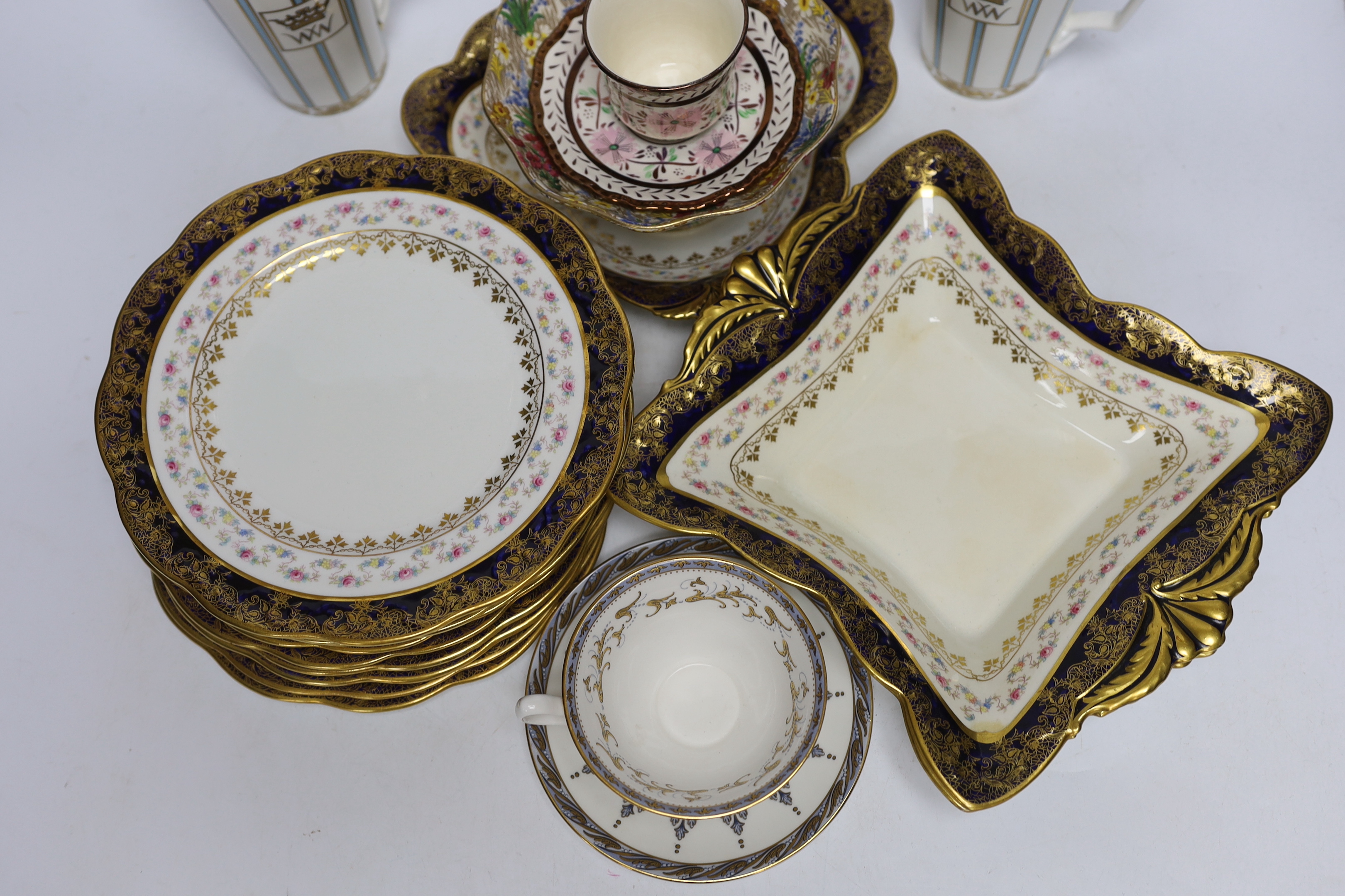An Aynsleys part dessert service and other tea wares including a pair of commemorative mugs